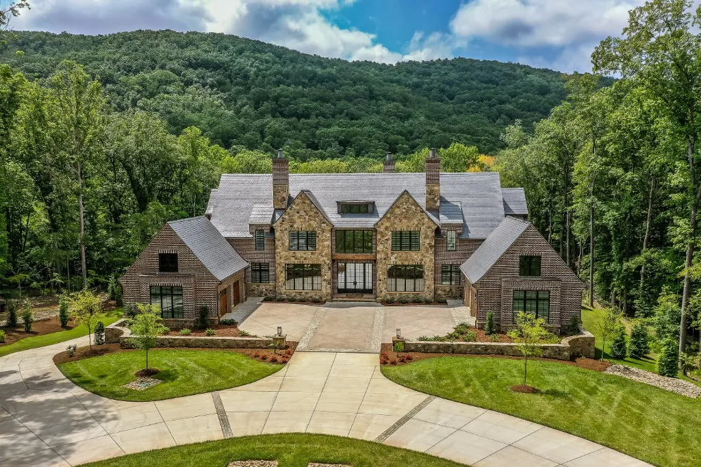 Mtn Lake — front elevation across the lawn with mountain backdrop