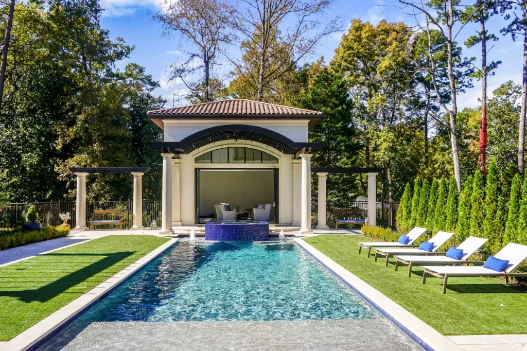 Peachtree Rd — poolside pavilion with folding glass wall