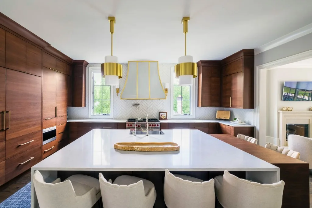 Sugarloaf Residence — walnut kitchen with brass hood and island